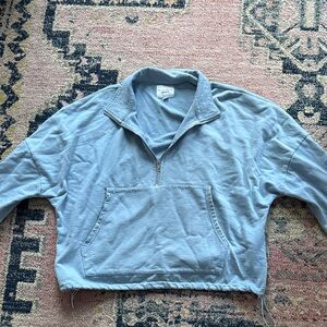 Woman’s Light Blue Zip-Up Sweater